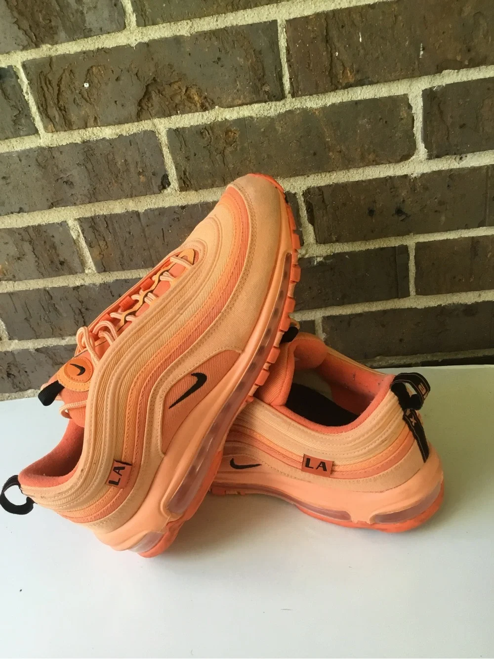 Nike Women’s Air Max 97 in Orange and Coral